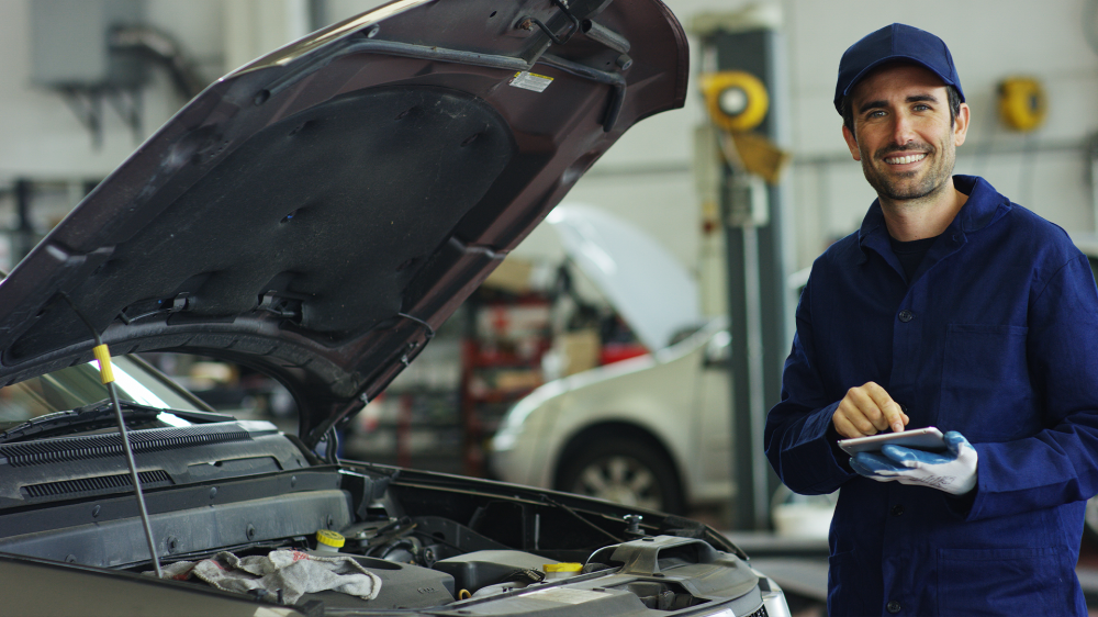 A professional working on a car.